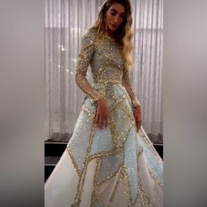 Custom made hand beaded long sleeve gown, worn once, floor length